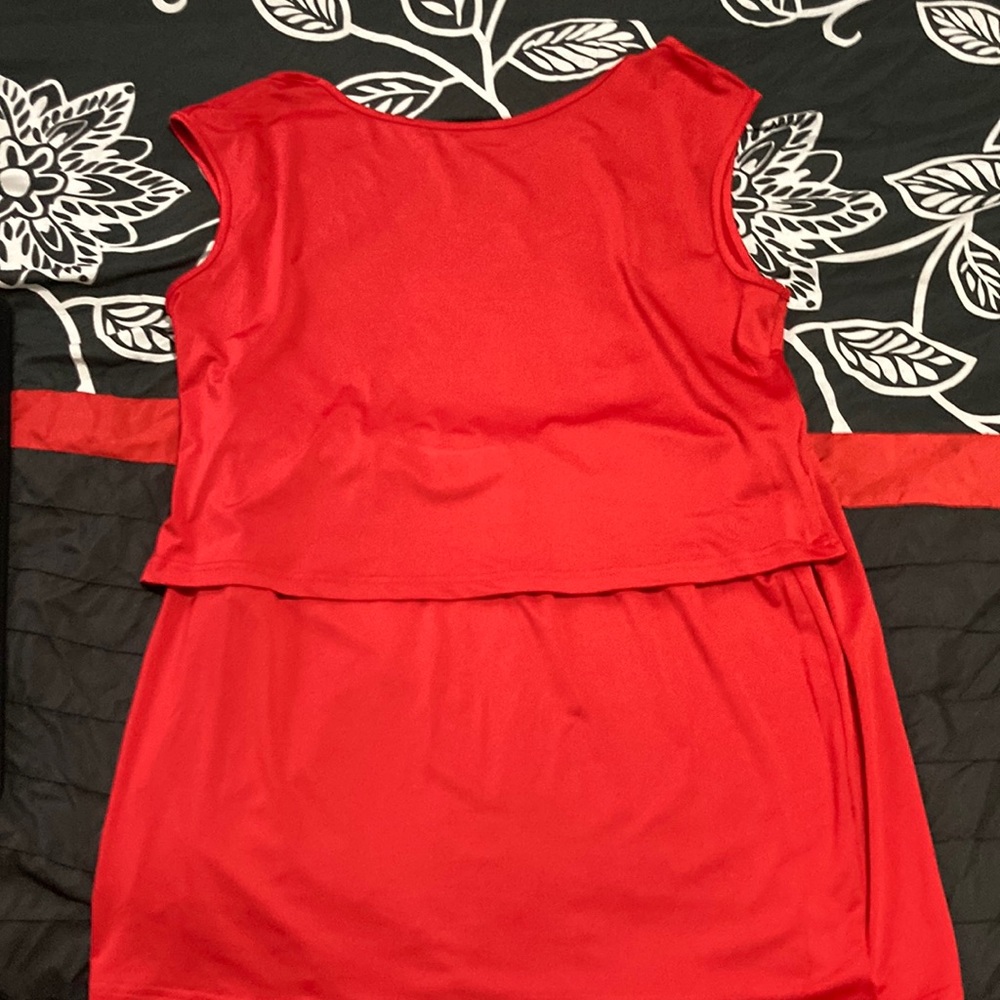 This is a plus size two piece. It’s a backless top with a skirt.
